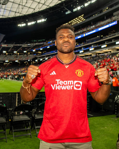 Francis Ngannou in a Man. Utd Jersey