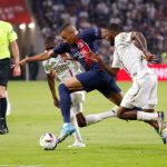 Mbappe drags two players to their goal post in the match at Lyon today