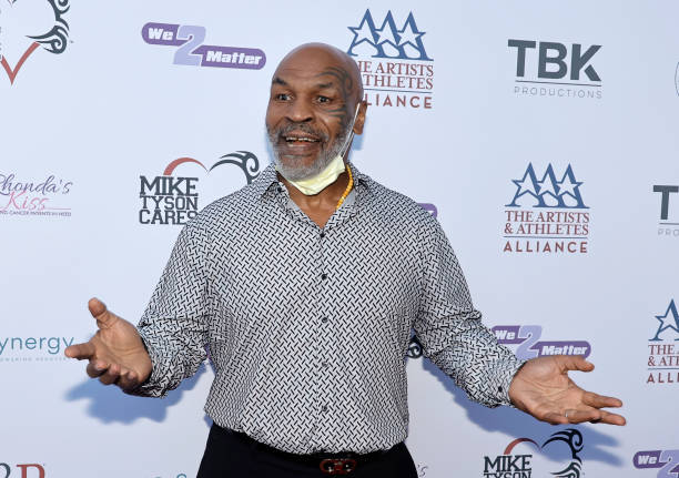 Mike Tyson has been challenged to a professional boxing match by John Fury