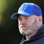 Wayne Rooney wearing an old cap at D.C United, his former club