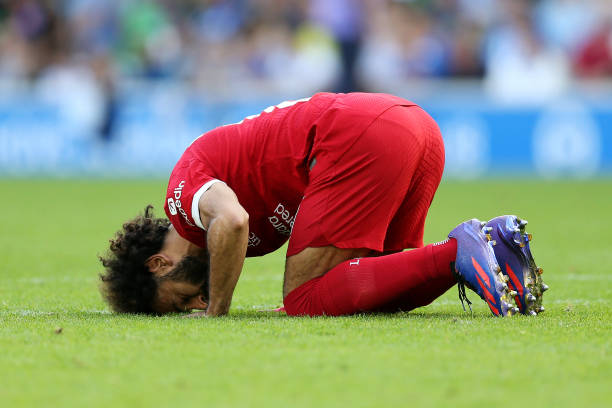 Mohamed Salah of Liverpool celebrates after scoring the team's second goal from a penalty